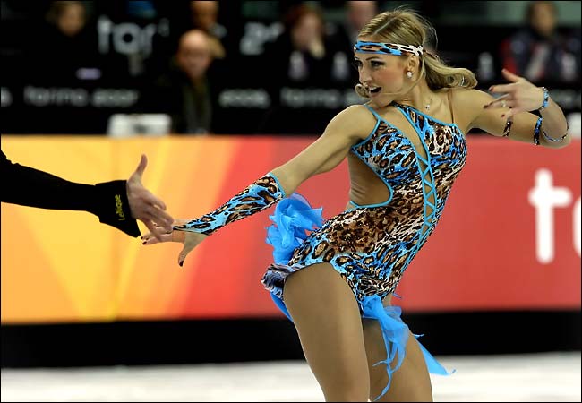 Tatiana Navka (and Roman Kostomarov -unseen) of Russia during their ice dancing routine, Turin Winter Olympics, February 19, 2006.
